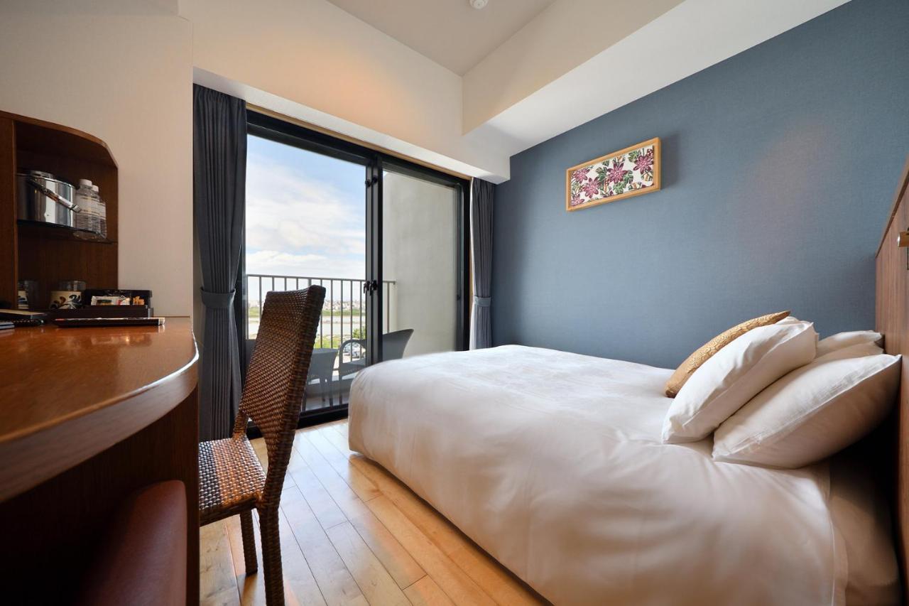 Senagajima Island Resort & Spa Tomigusuku Quarto foto
